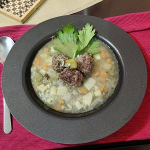 A homemade vegetable soup with beef meatballs, gluten free, dairy free, lactose free